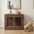Dog standing next to a furniture style wooden crate in living room